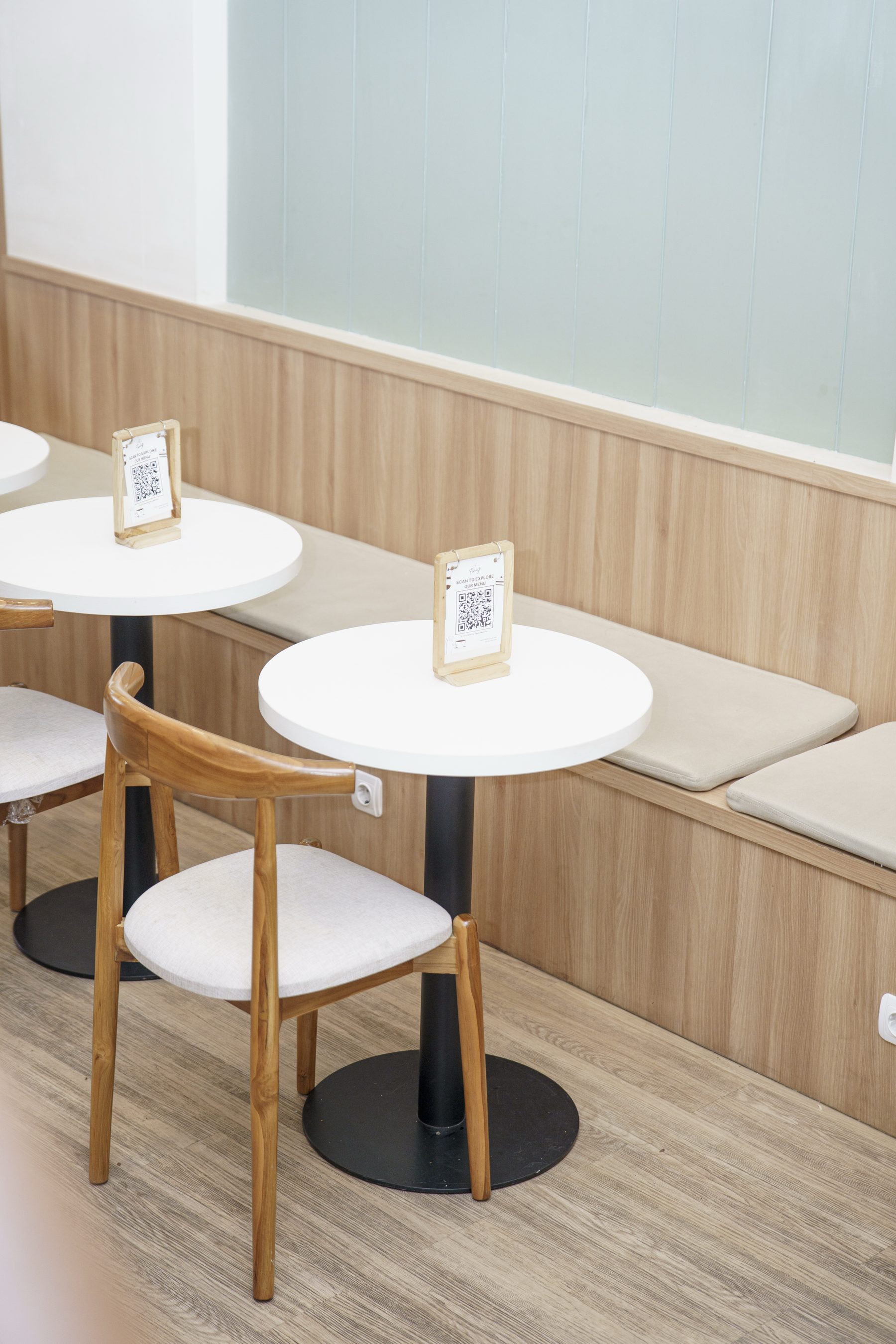 Marble bistro tables along the counter